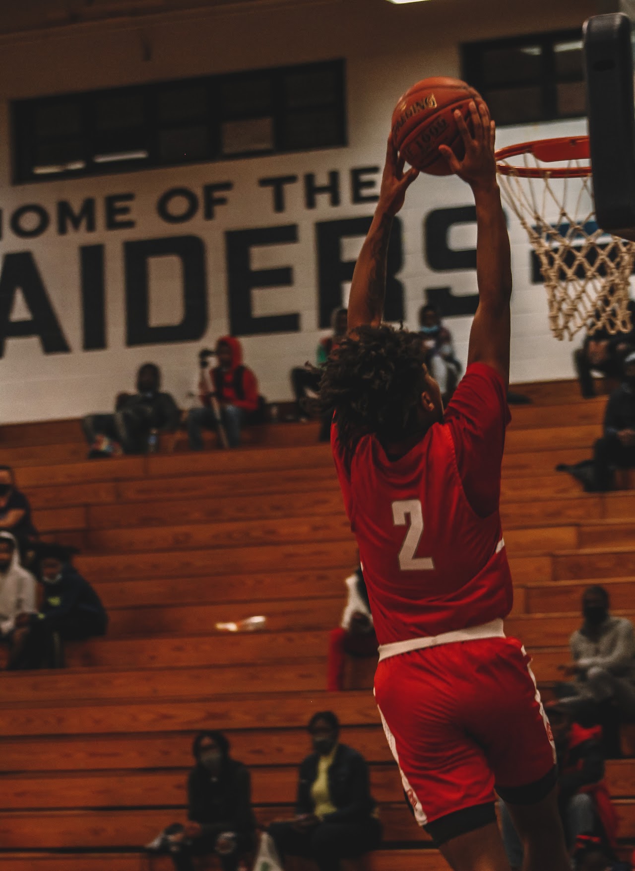 player jumping to the basket