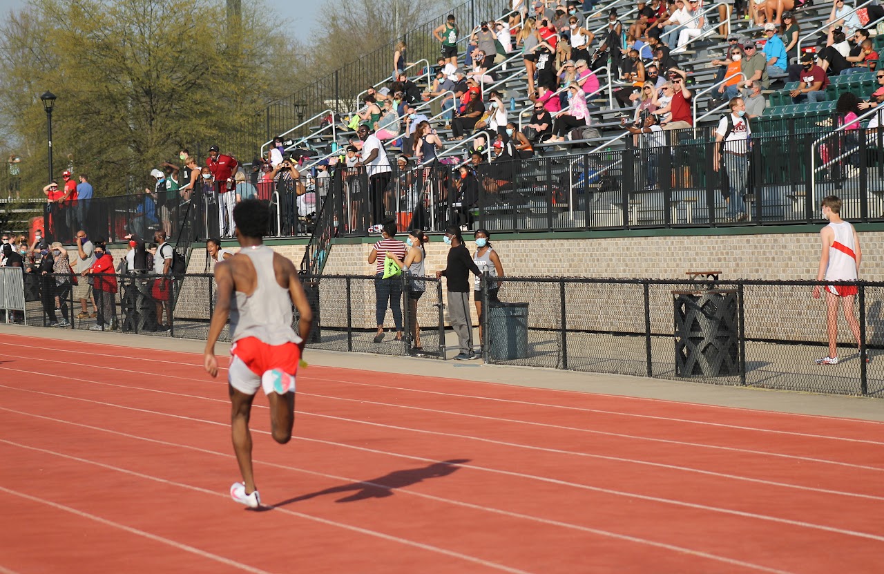 student running photo from behind