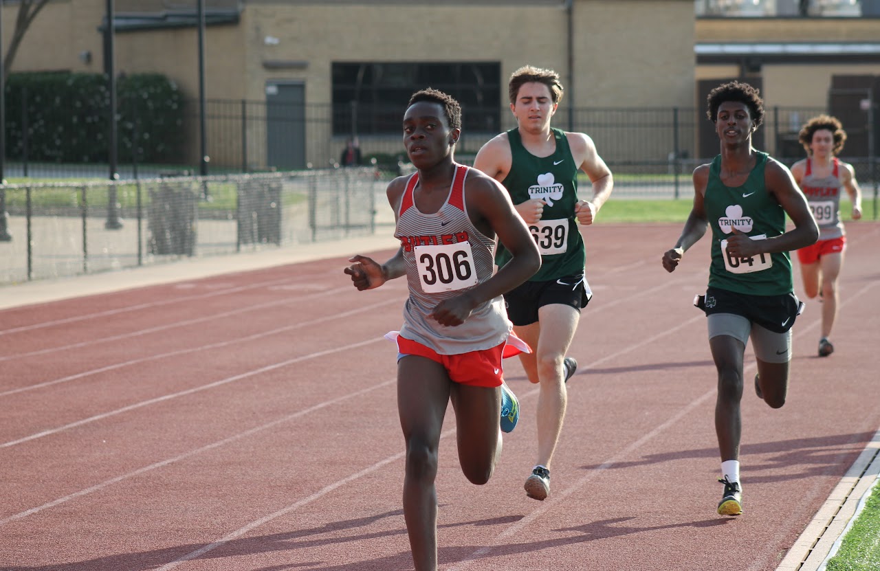 two trackers running on the field