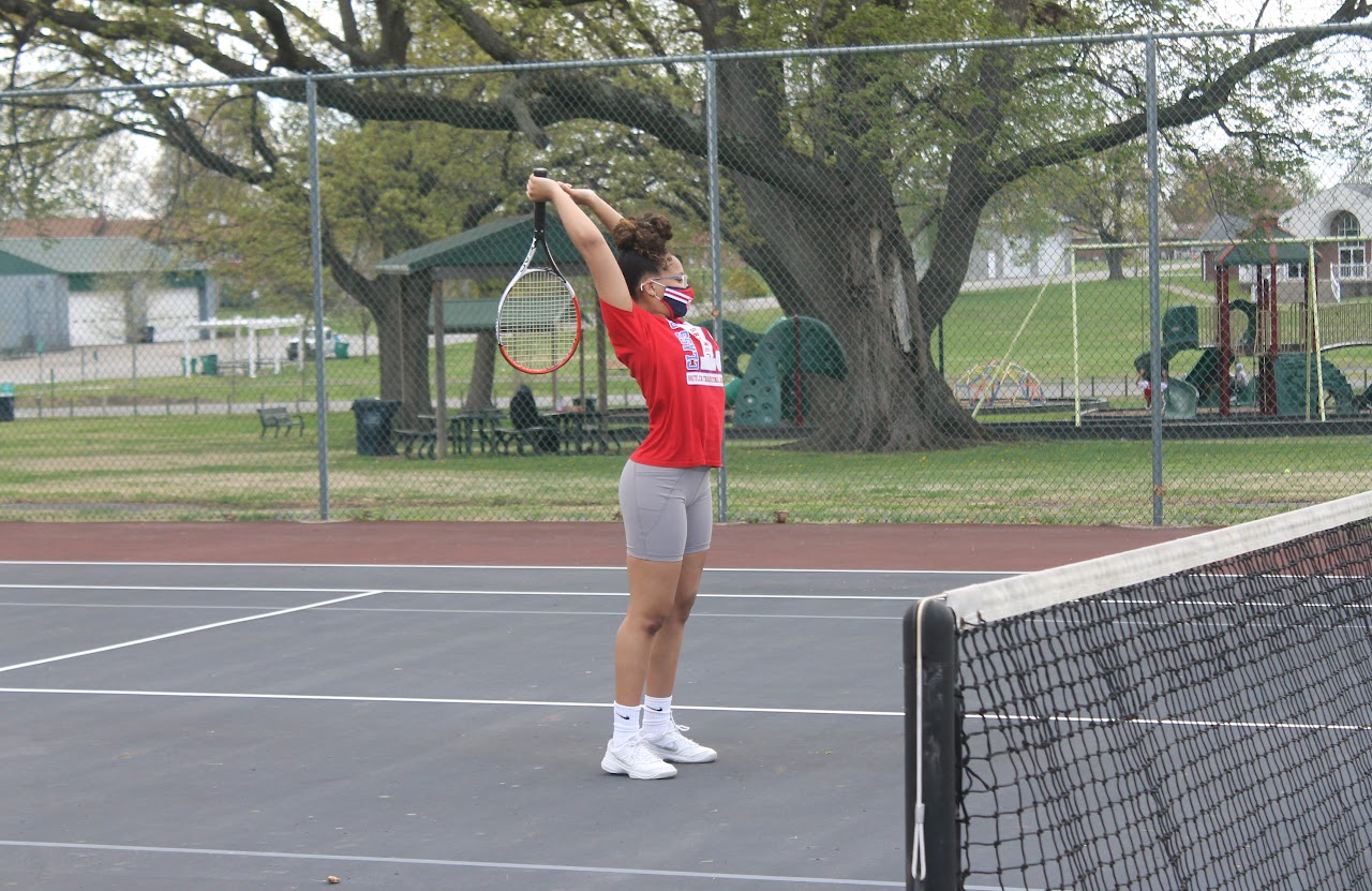 player stretching on the court