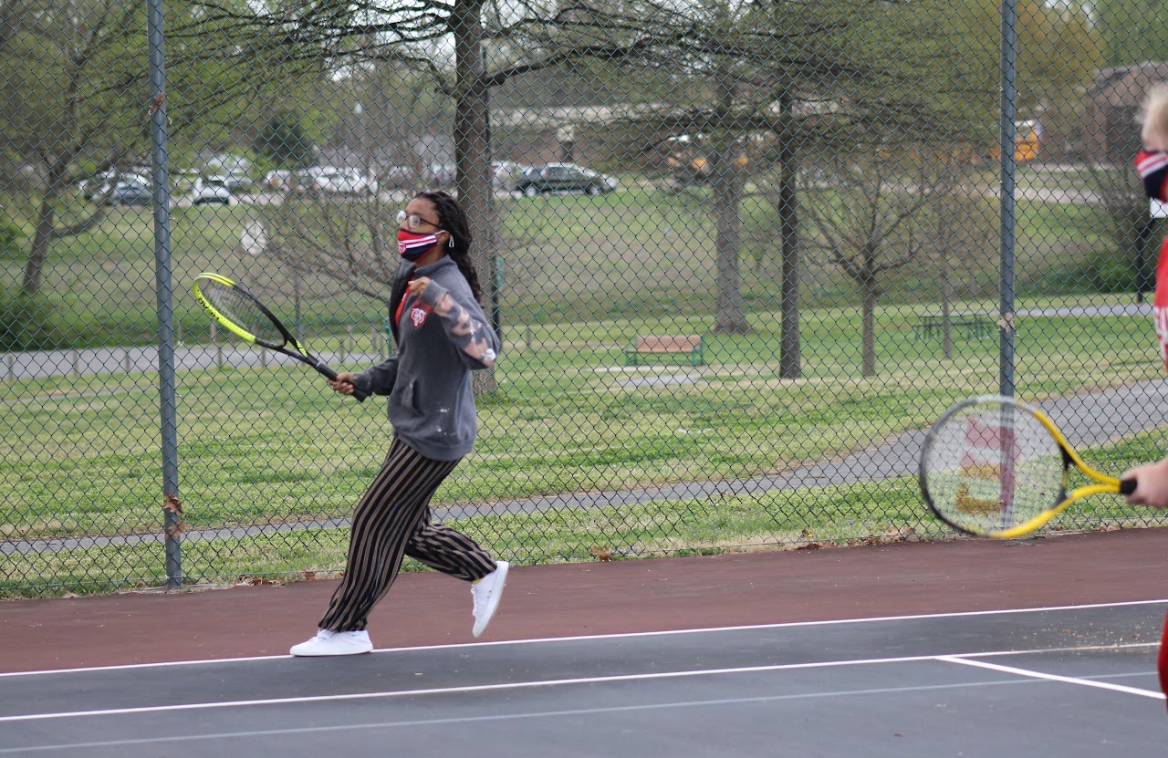 student running on the court