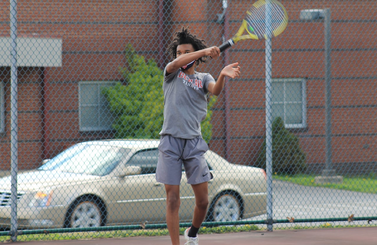 player jumping to hit the ball