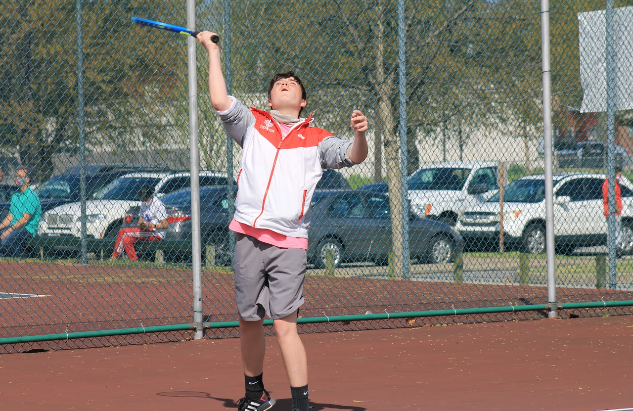 player jumping and hitting the ball