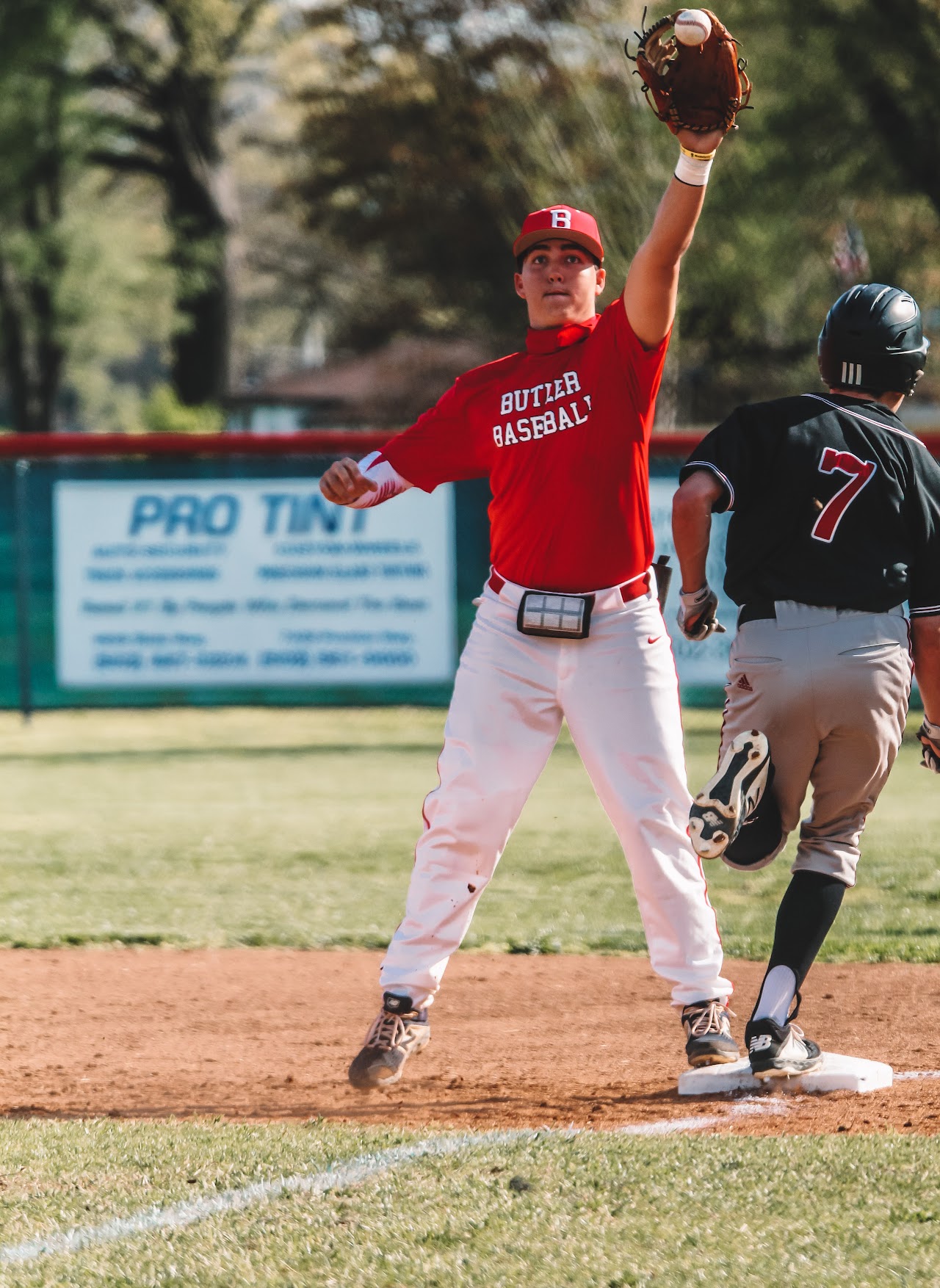 player jumping to catch the ball