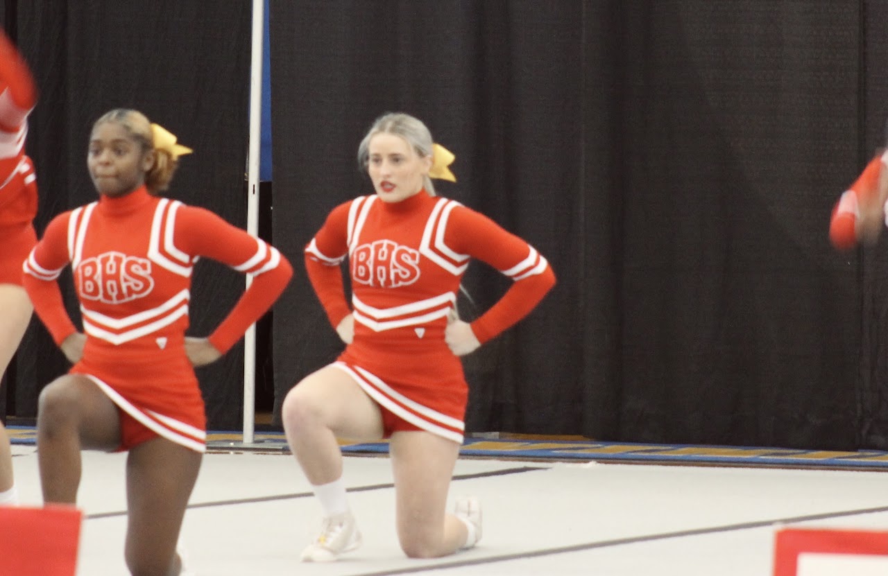 Cheerleader with her knee up