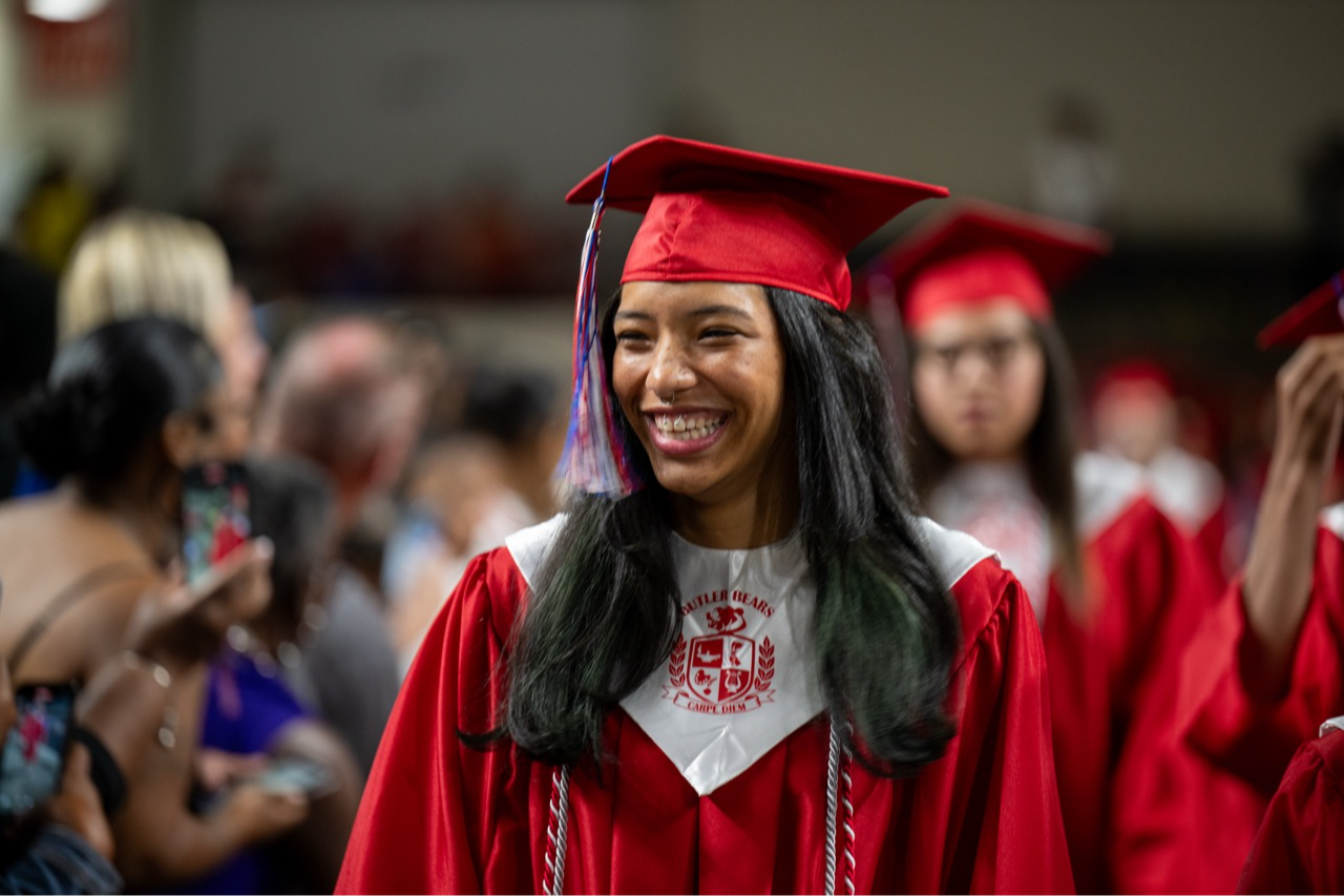 Student smiling at graduation