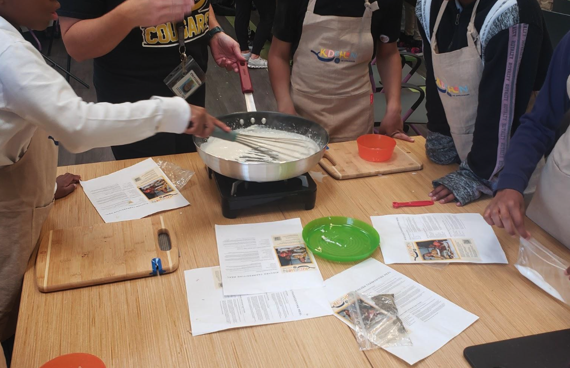 Students cooking together