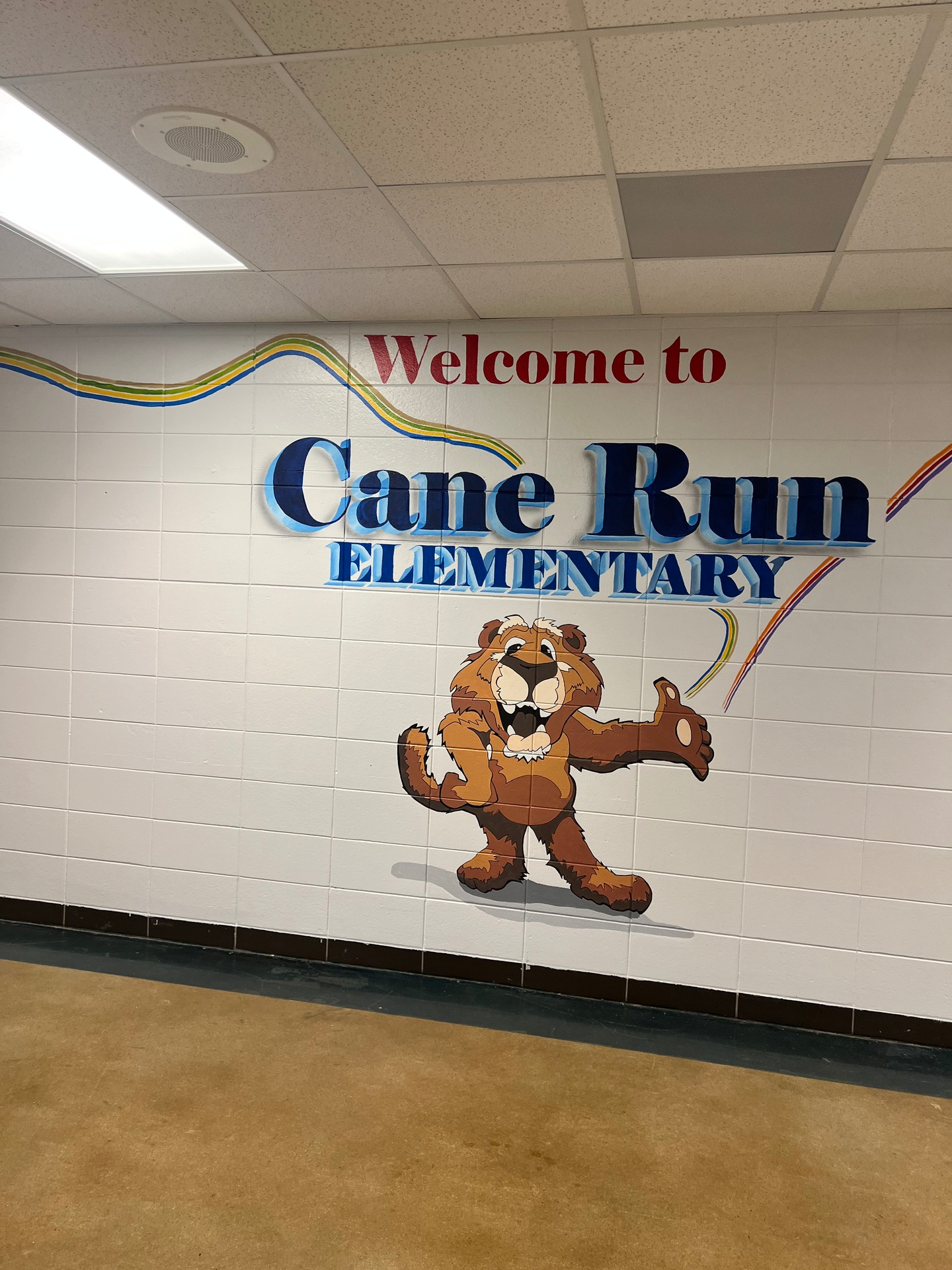 cane run mascot on wall