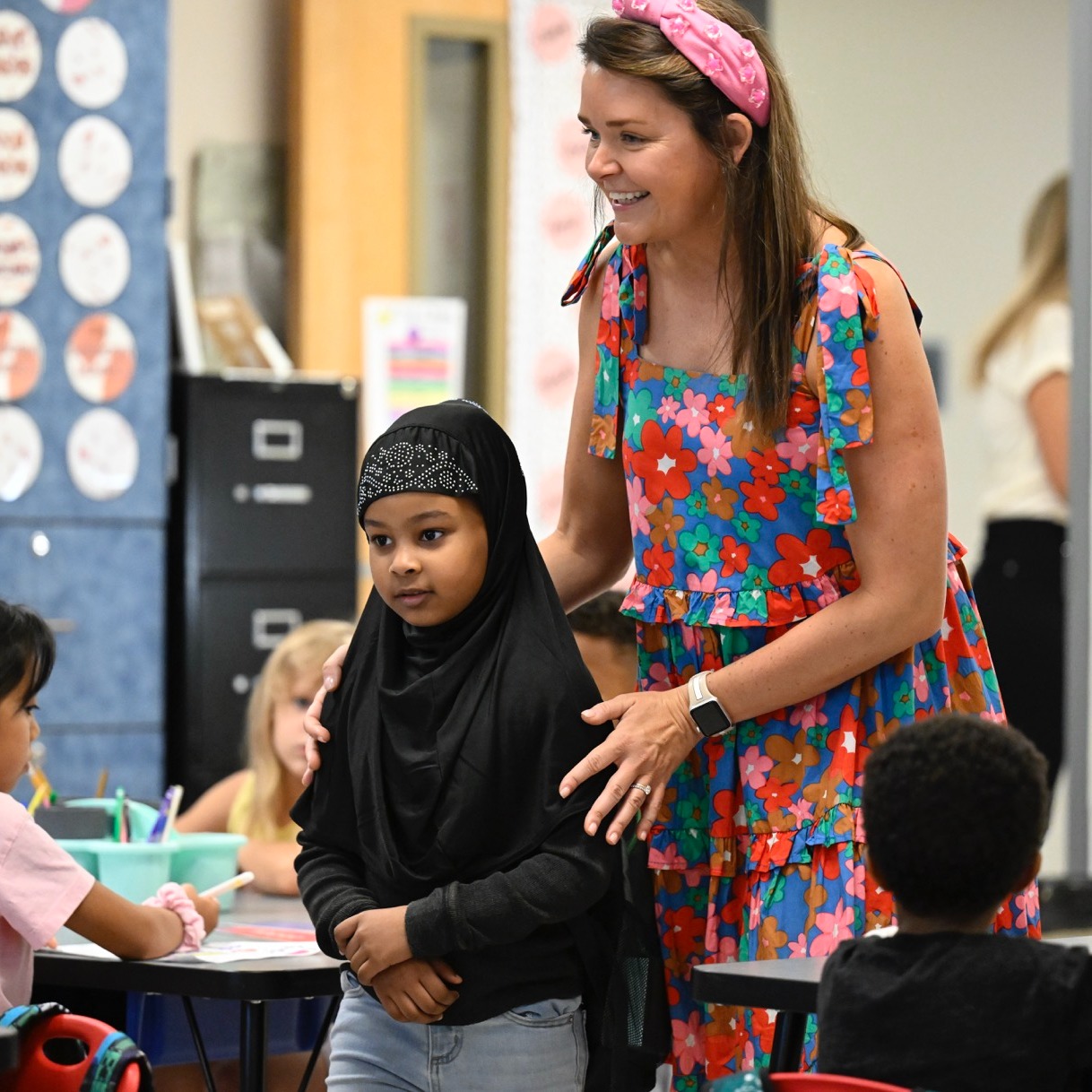 Student and Teacher in Classroom