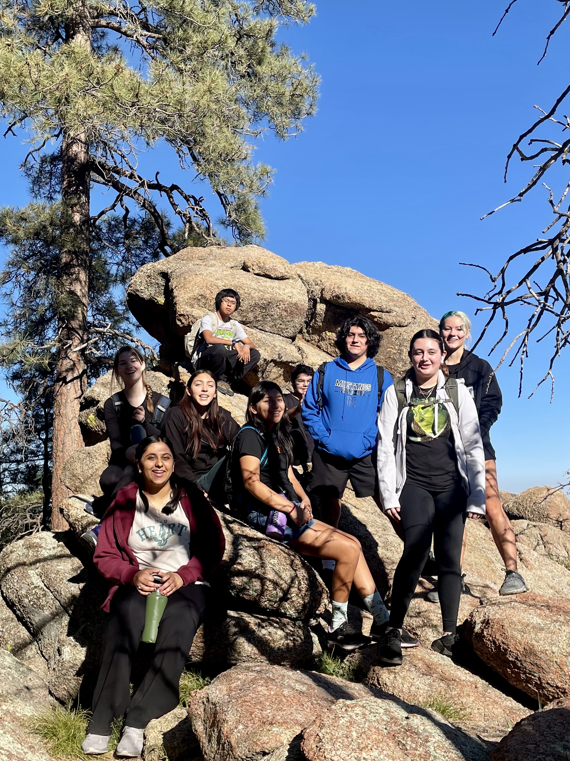 students on top of mountain