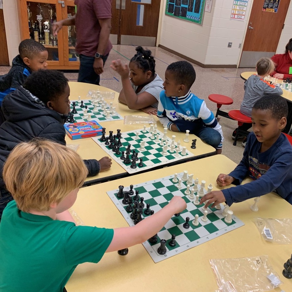 Students playing chess