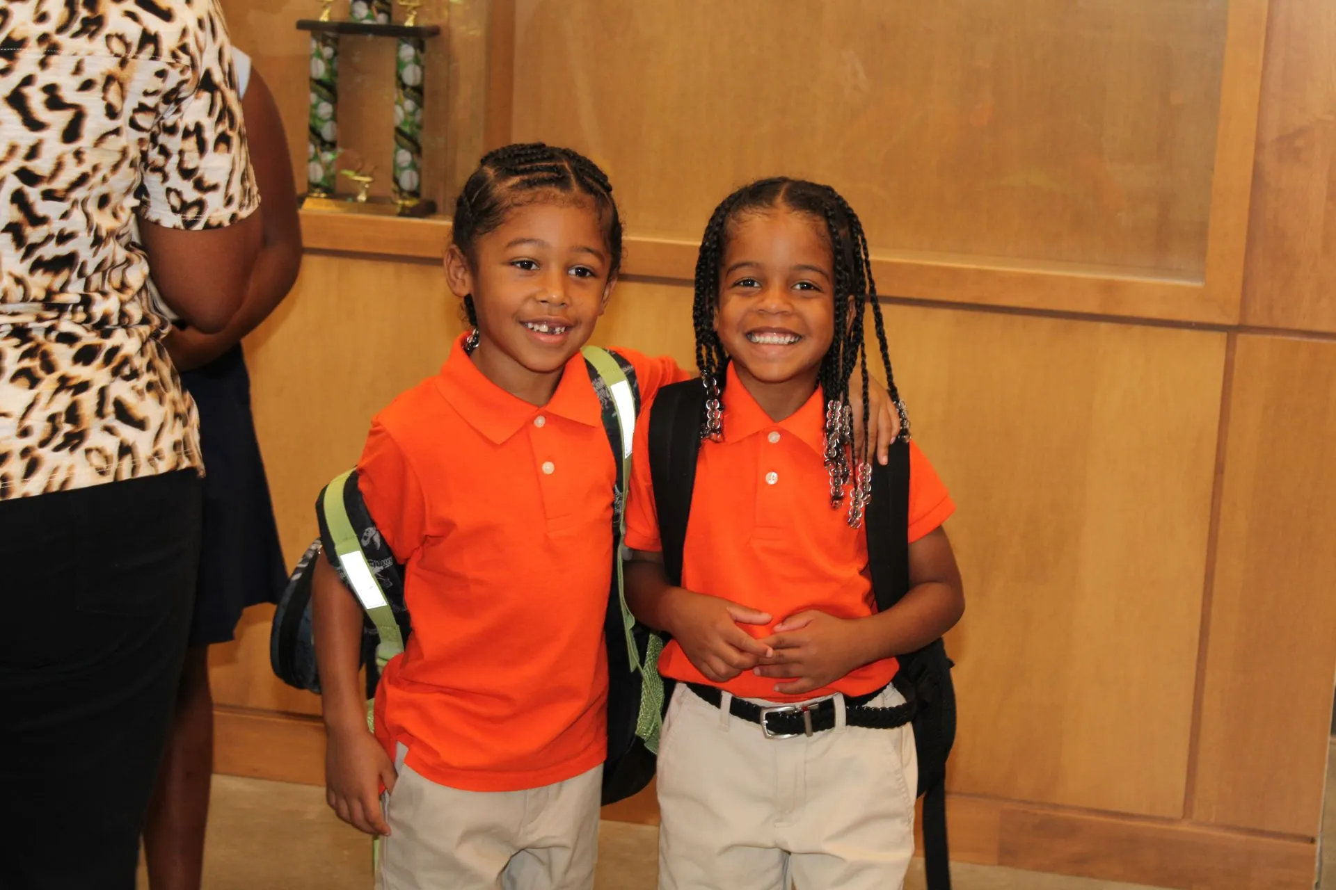 Two students posing and smiling