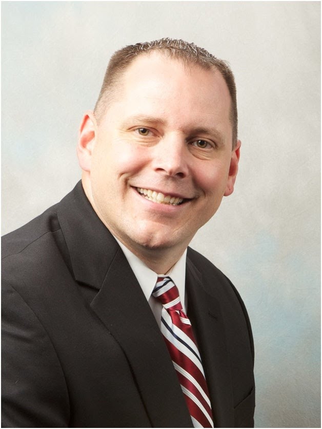 Dr. Chris Becker-Principal