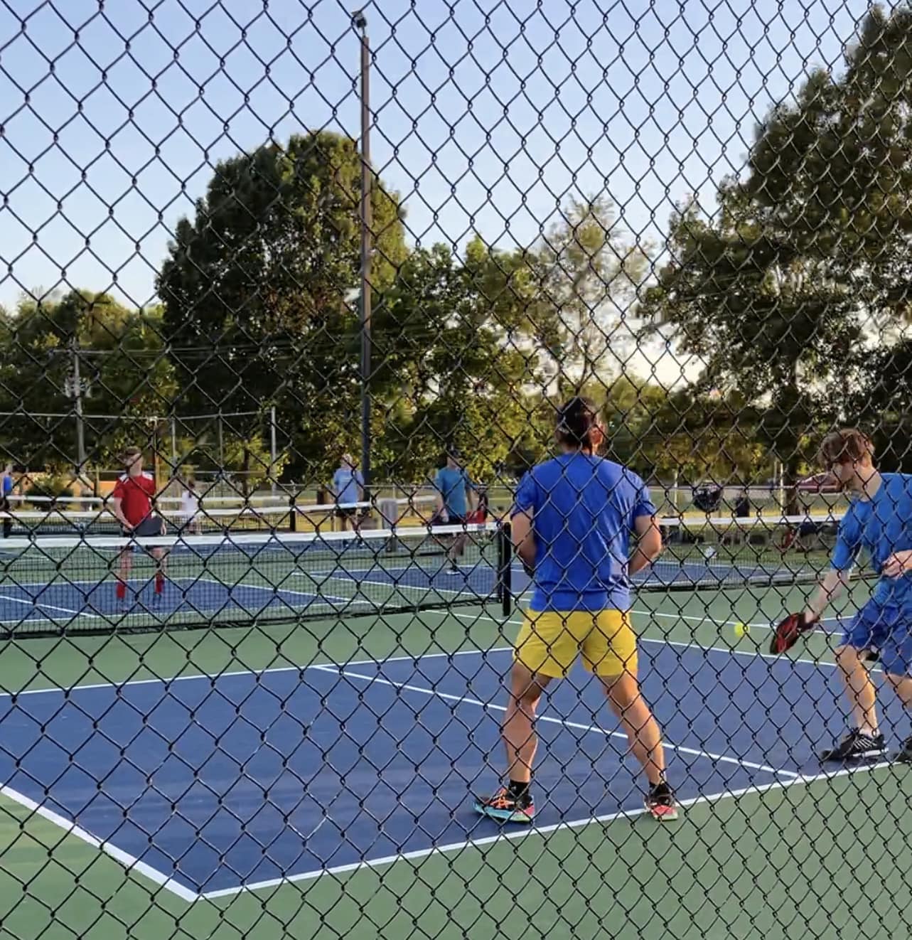 People playing pickleball