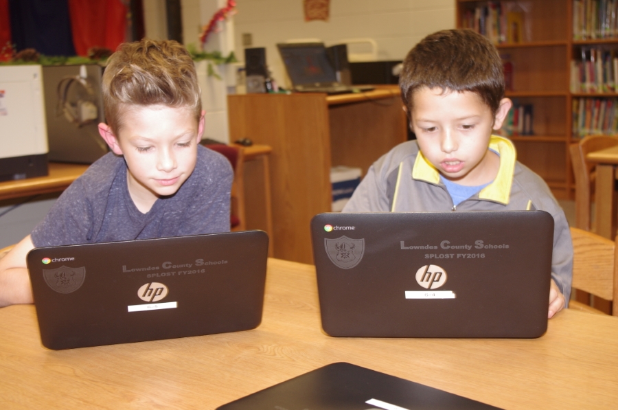 Students with Chromebook