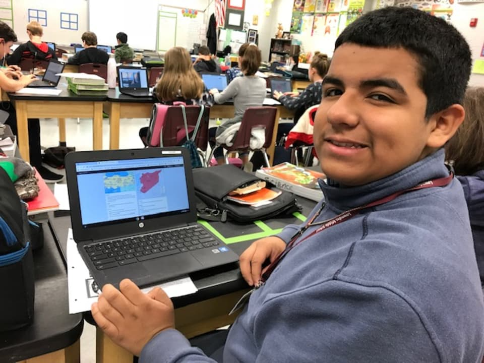 Student with chromebook