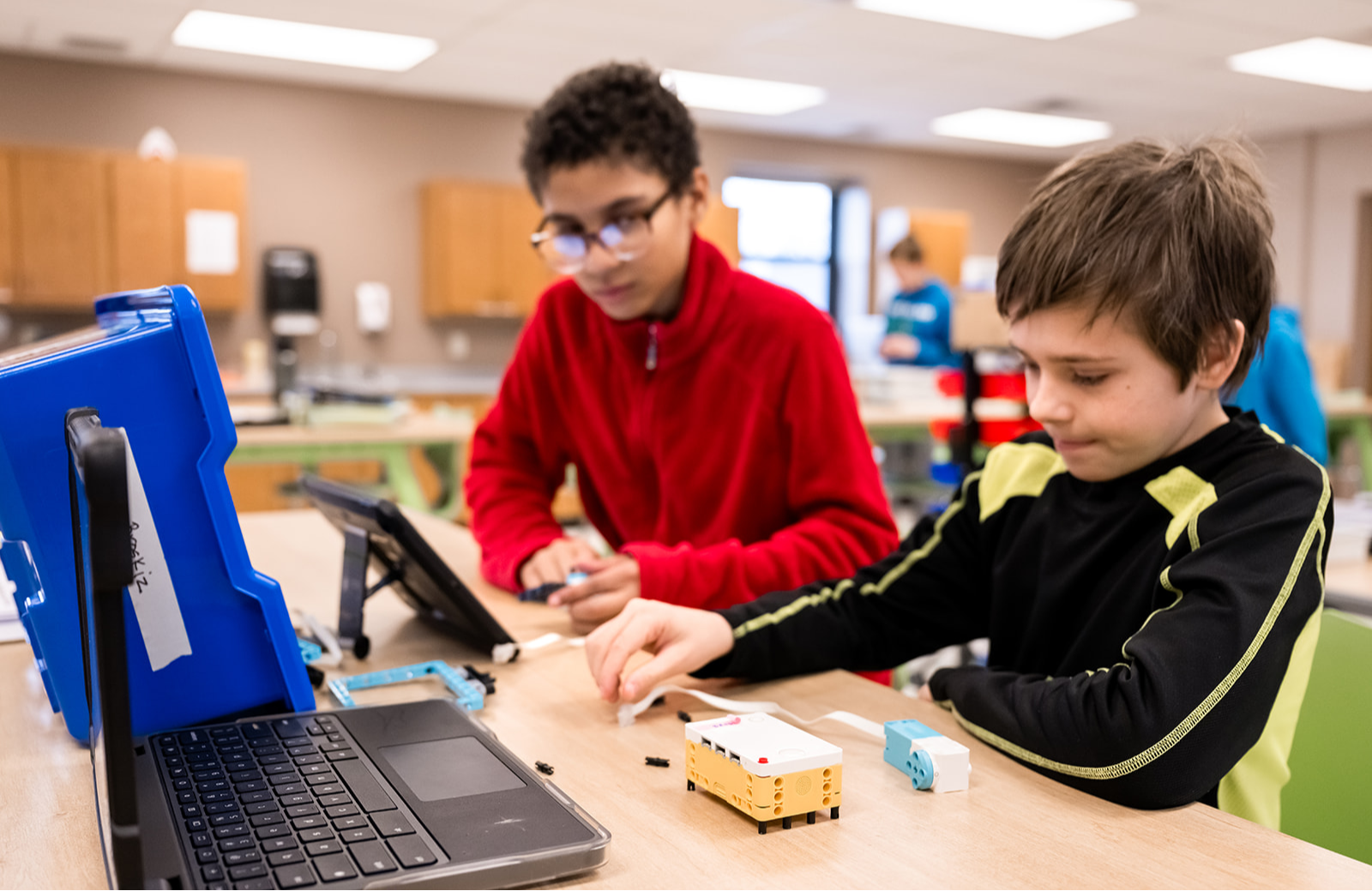 young student in robotics class