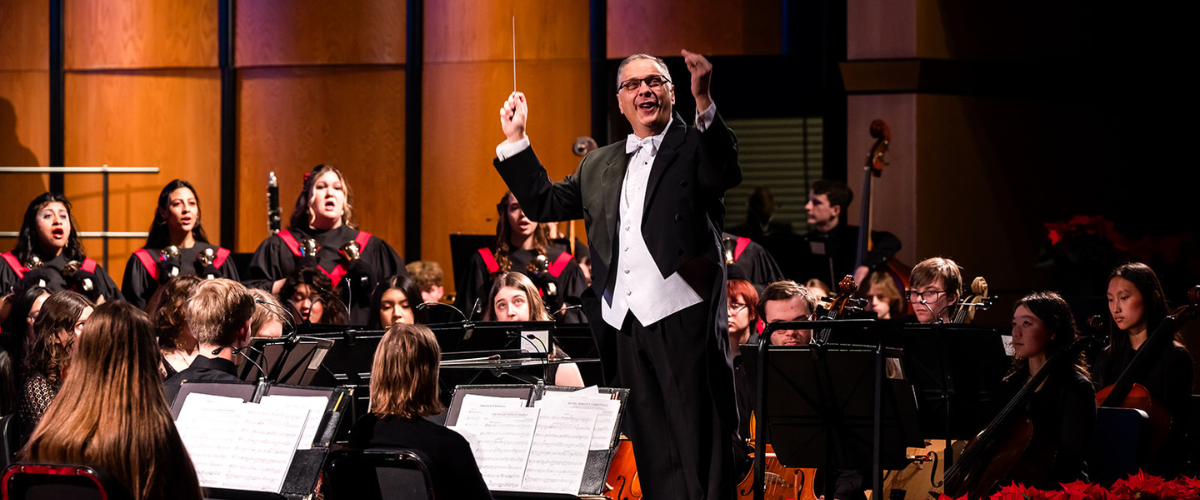 music director and students performing