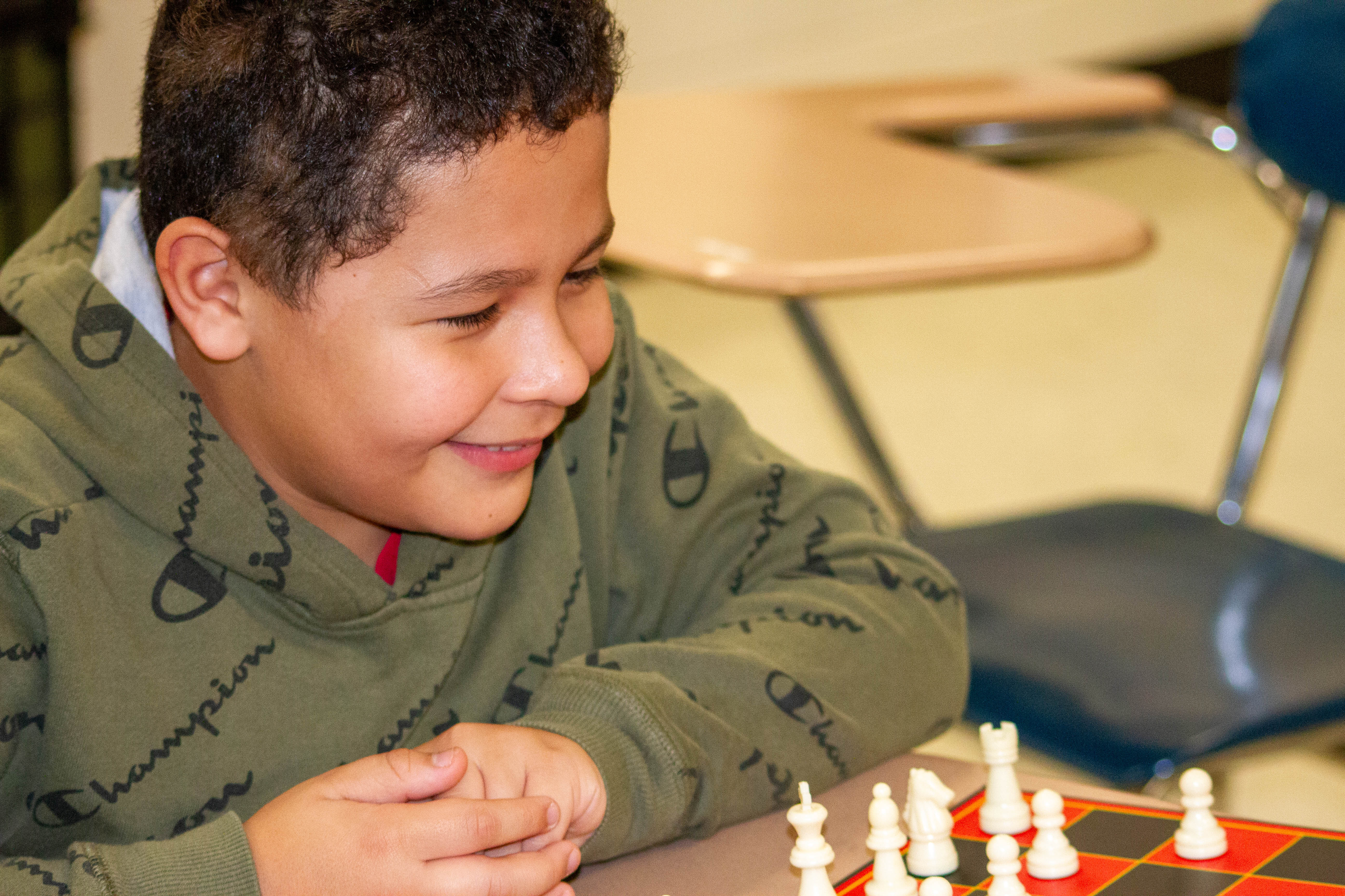 Students at East Lee Middle enjoy chess club during in-school club time.