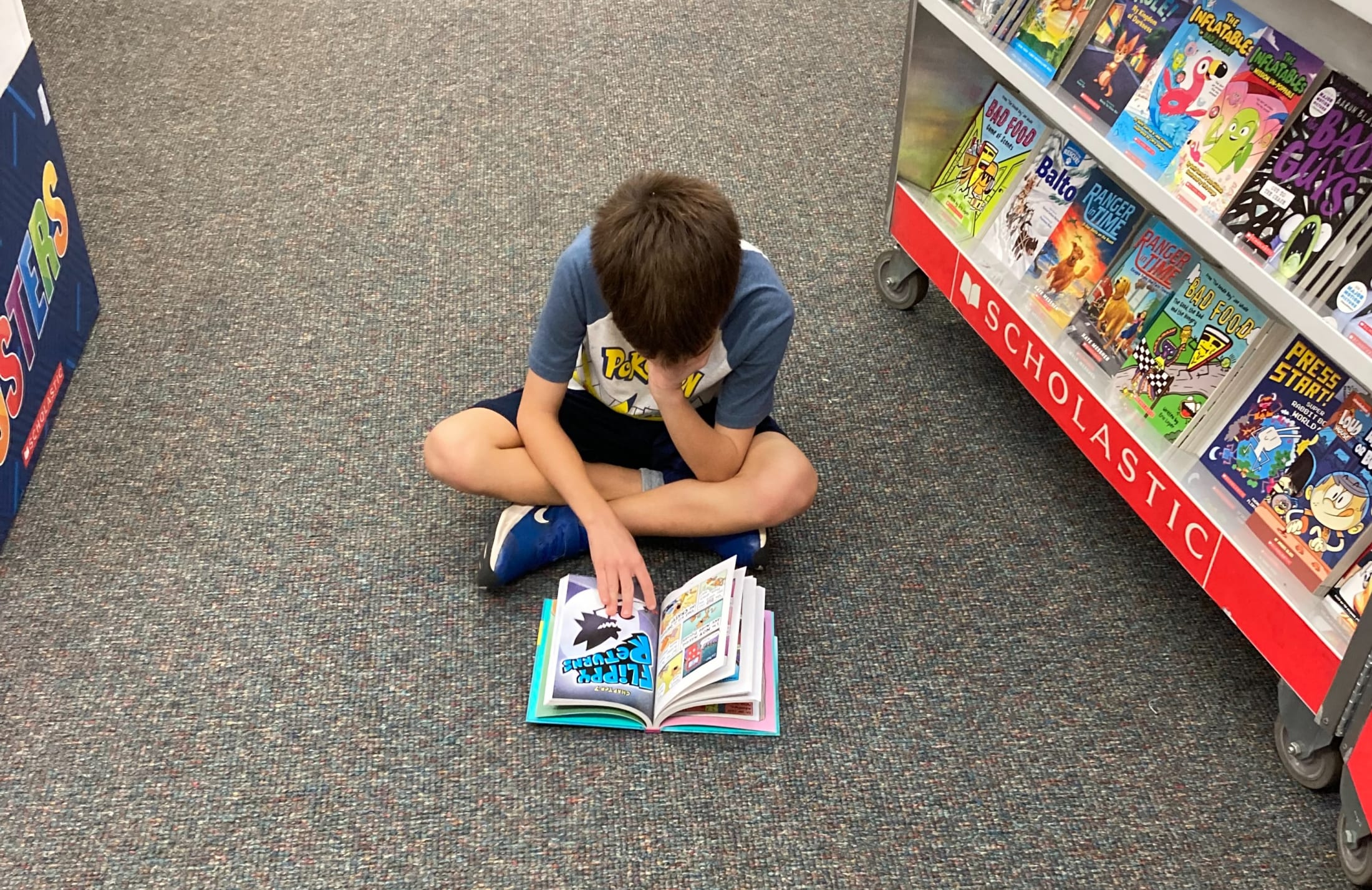 book reading a book at a book fair