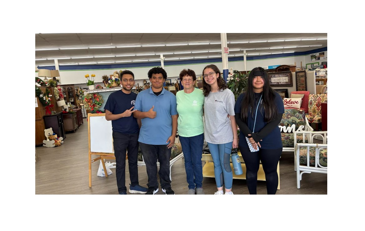 National Honor Society students volunteered with Habitat for Humanity , and helped to  organize and clean the store.