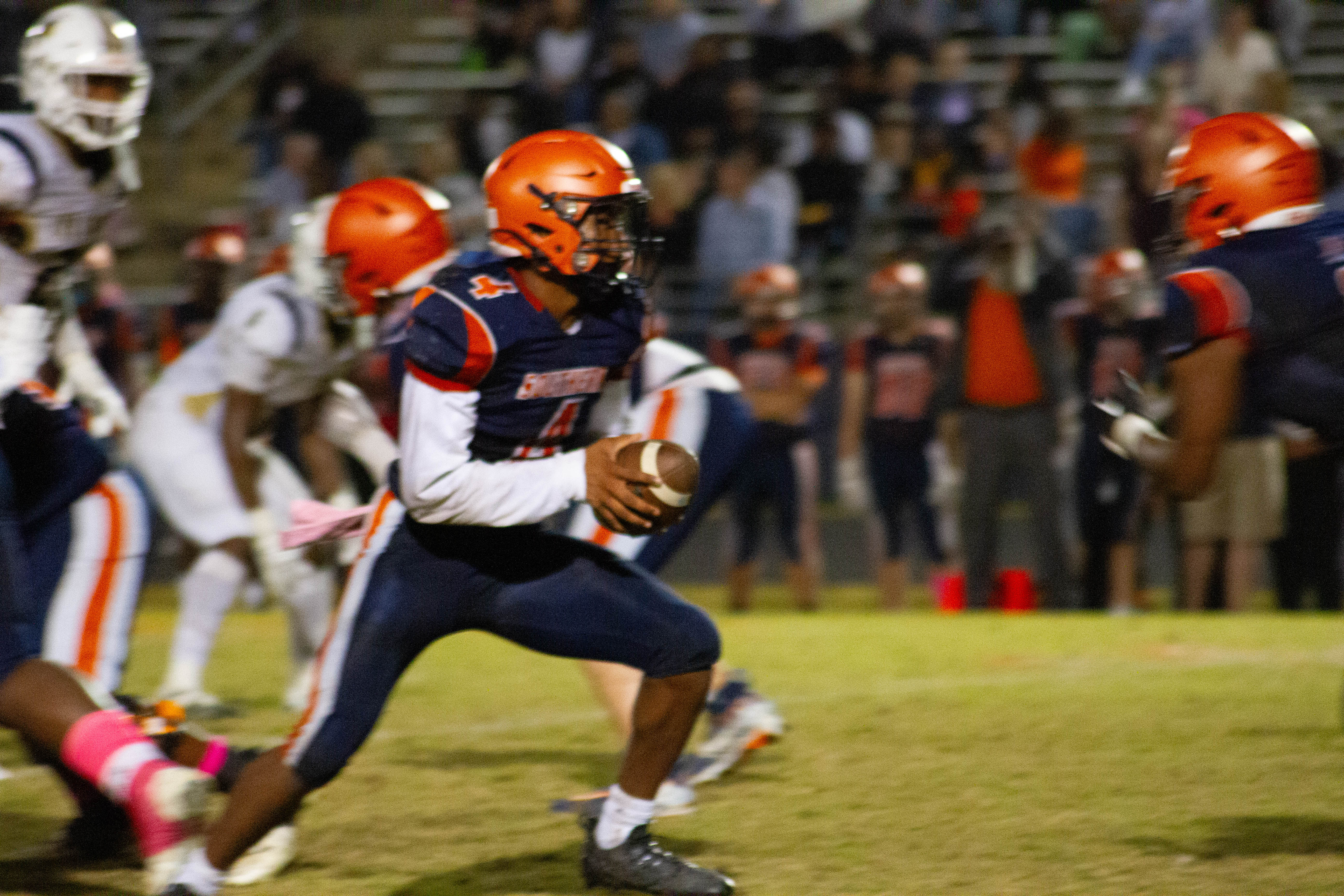 Quarterback handing off