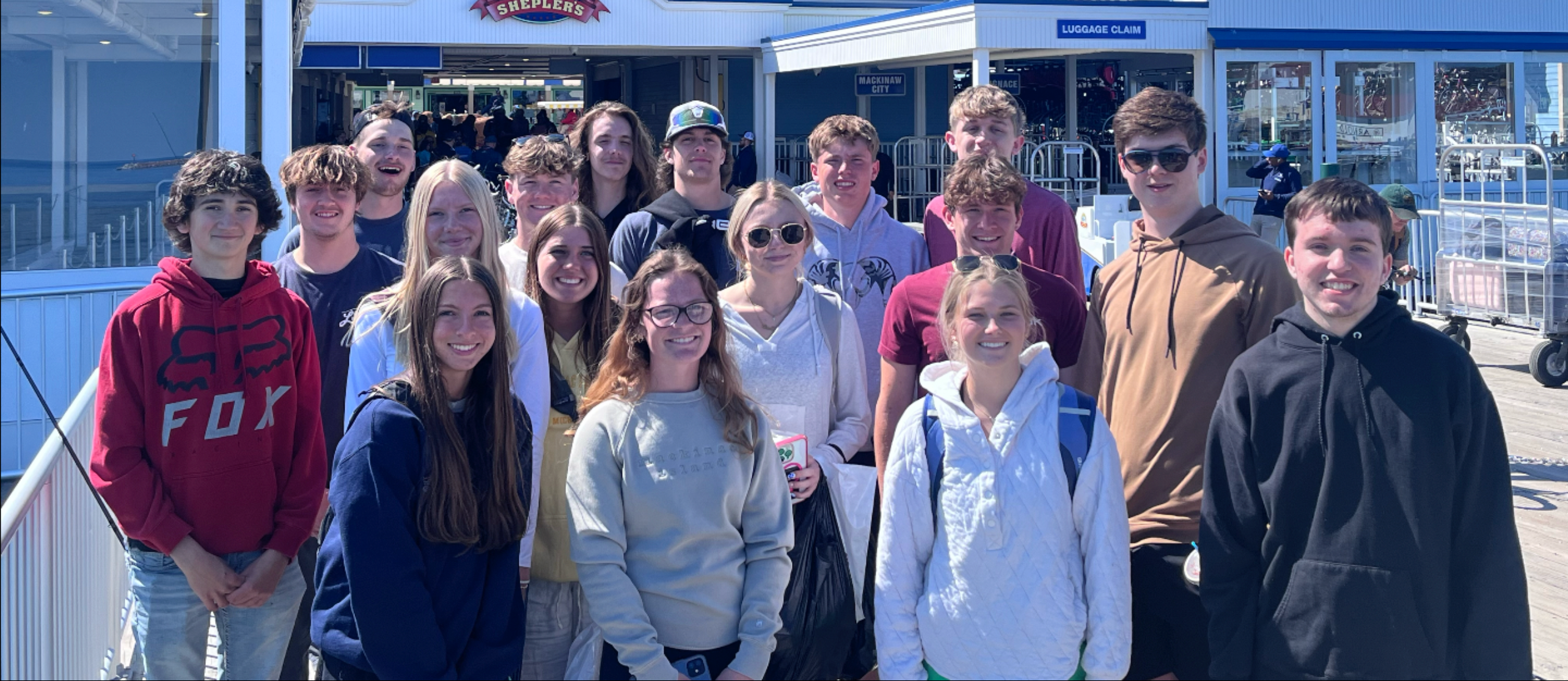 Onekama's class of 2025 poses together on Mackinac Island for a group photo.