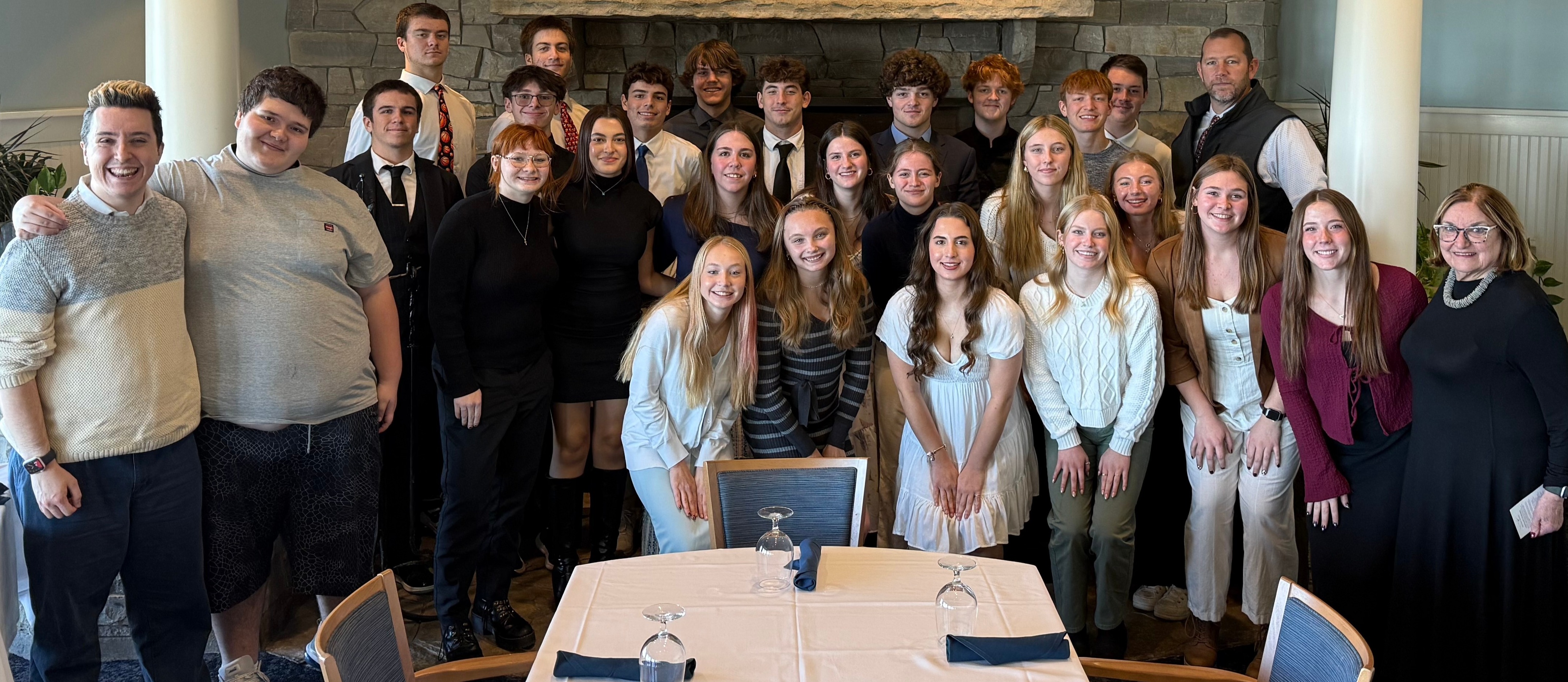 Class of 2026 seniors, Mrs. Beth McCarthy, Mr. Zane Harding, and Mr. Dave Huntington at this year's annual senior etiquette brunch.