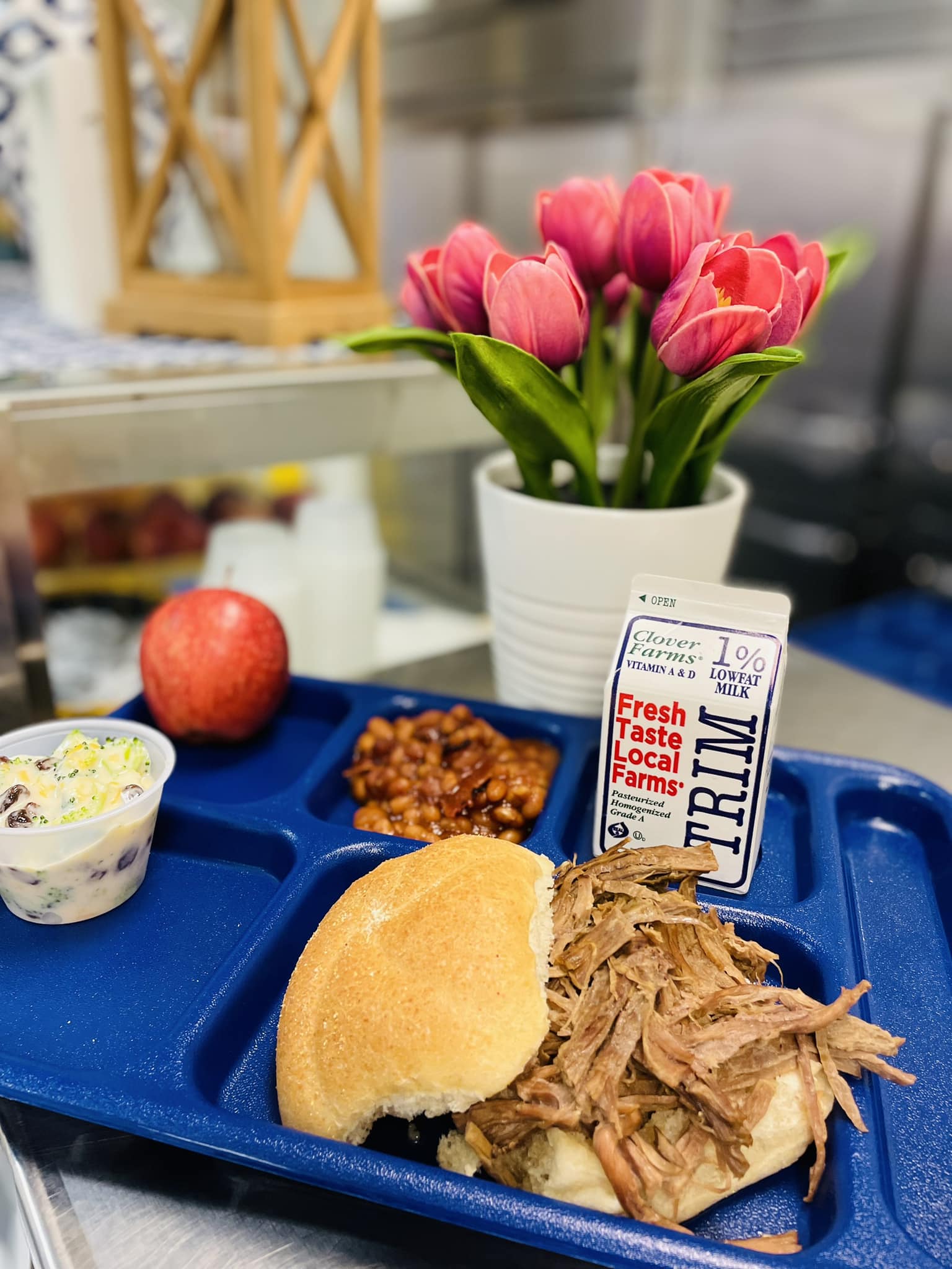 beef brisket sandwich on lunch tray