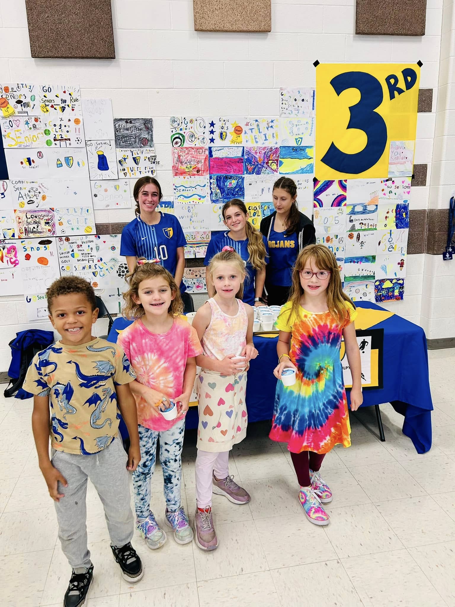 elementary students with athletes