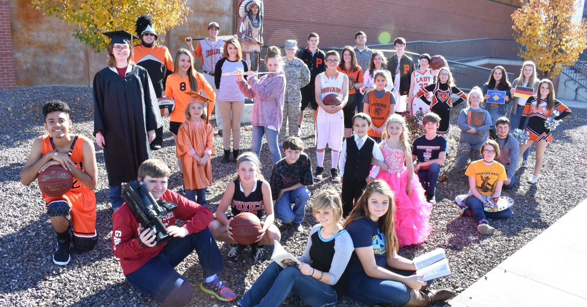 Puxico students from different organizations and teams pose in their uniforms