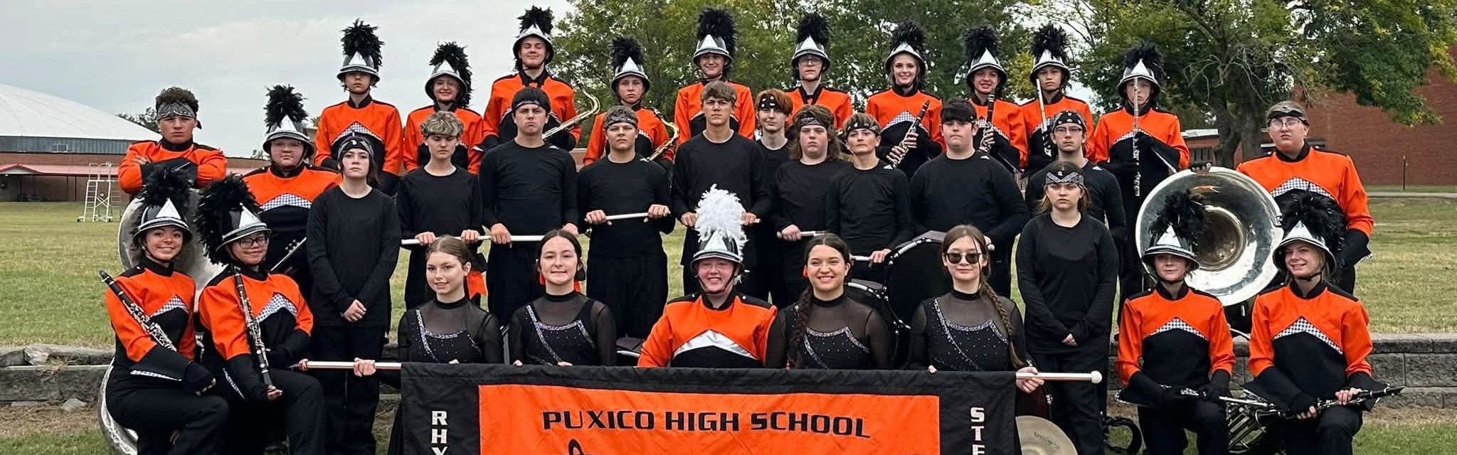 The Puxico Marching Band wrapped up its competition season UNDEFEATED! The band earned FIRST PLACE among Class 2 bands and won the auxiliary and marching captions—with the highest marching score of the entire competition! 