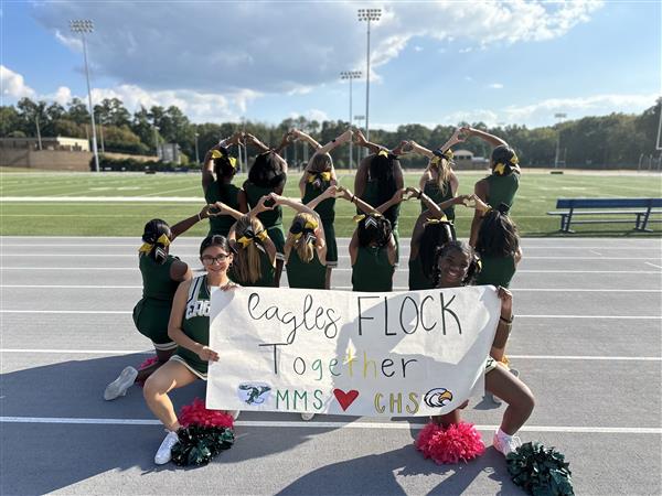 Cheerleaders in track field