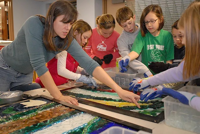 children working on stained glass project