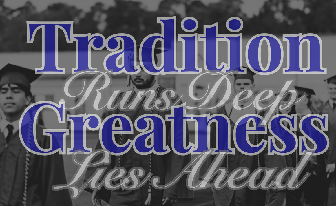 Black and white image of students in graduation gowns and caps walking on a track.