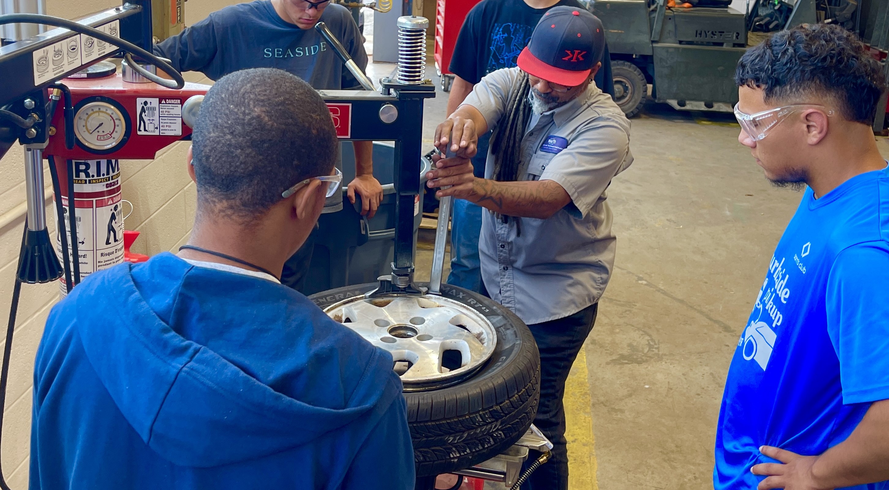 NWTI Intro to Automotive Technology tire changing picture