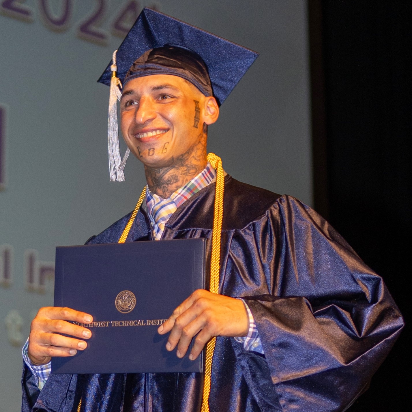 close up of a graduate on stage