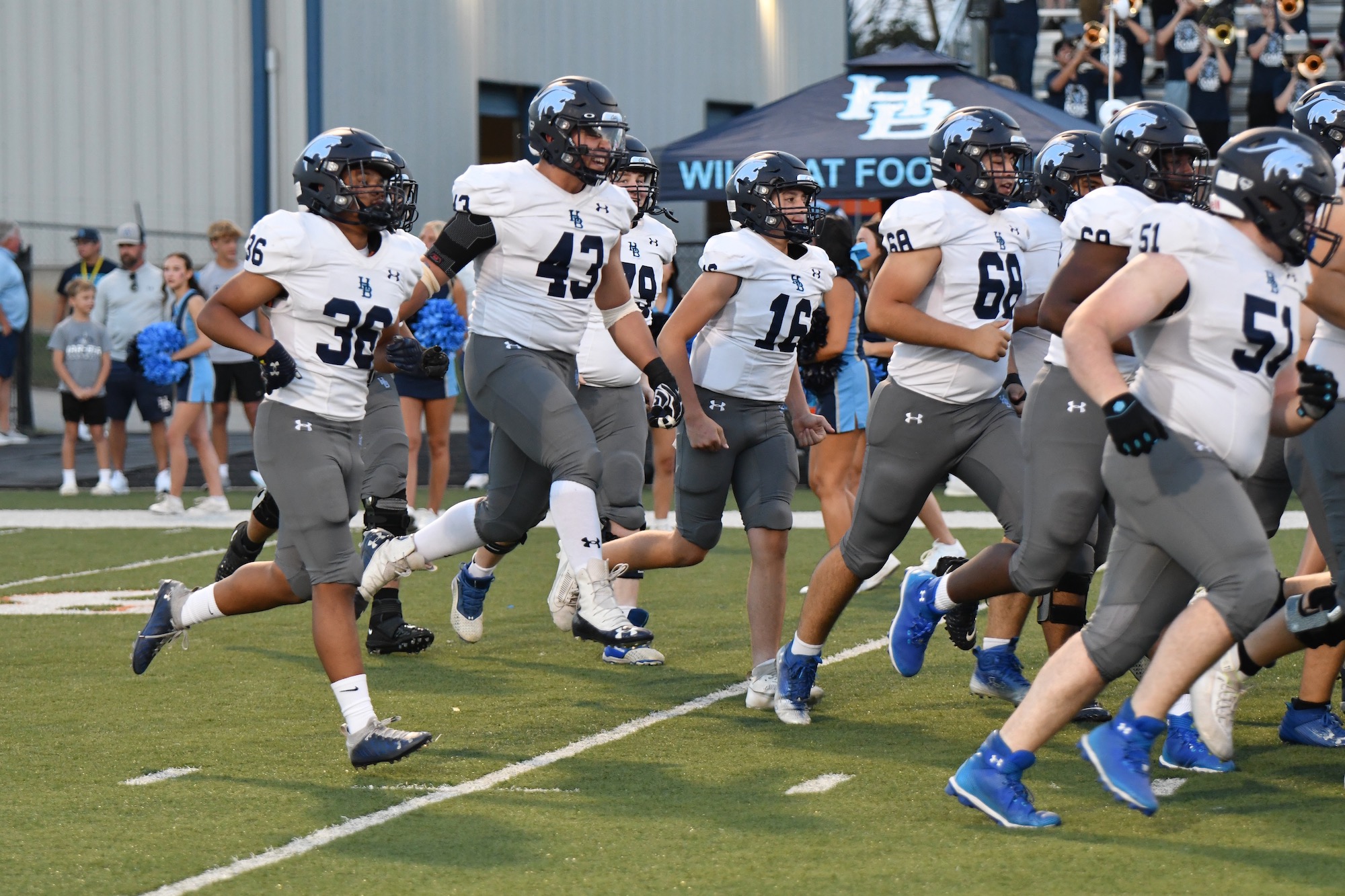 players running on field