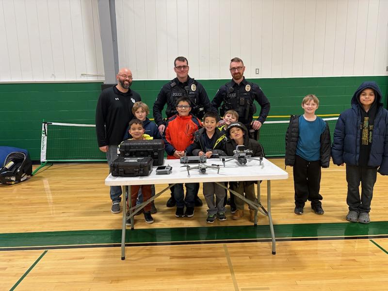 police officers with STEAMM students