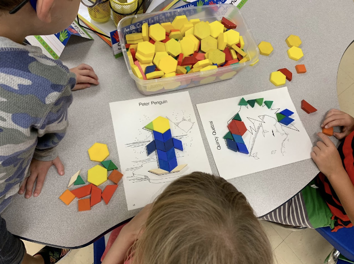 kid focused coloring at a classroom