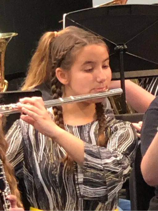 girl playing flute