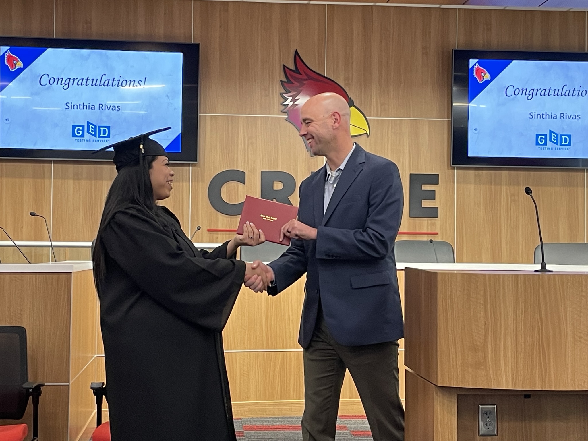 graduate receiving diploma