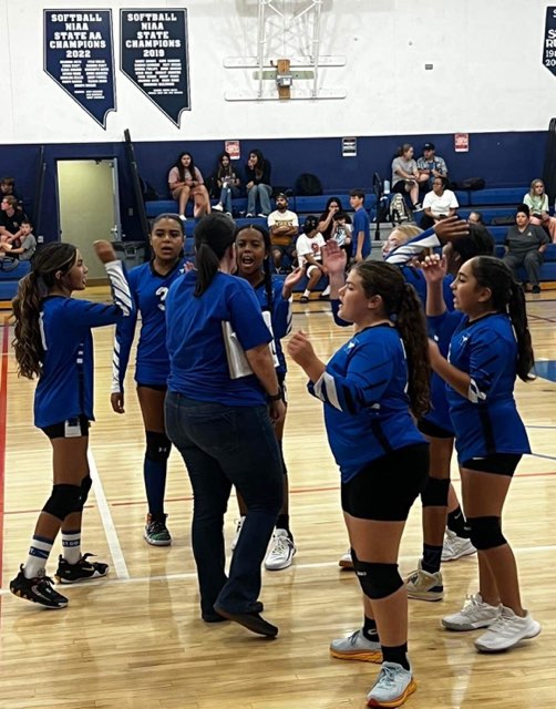 Volleyball in huddle