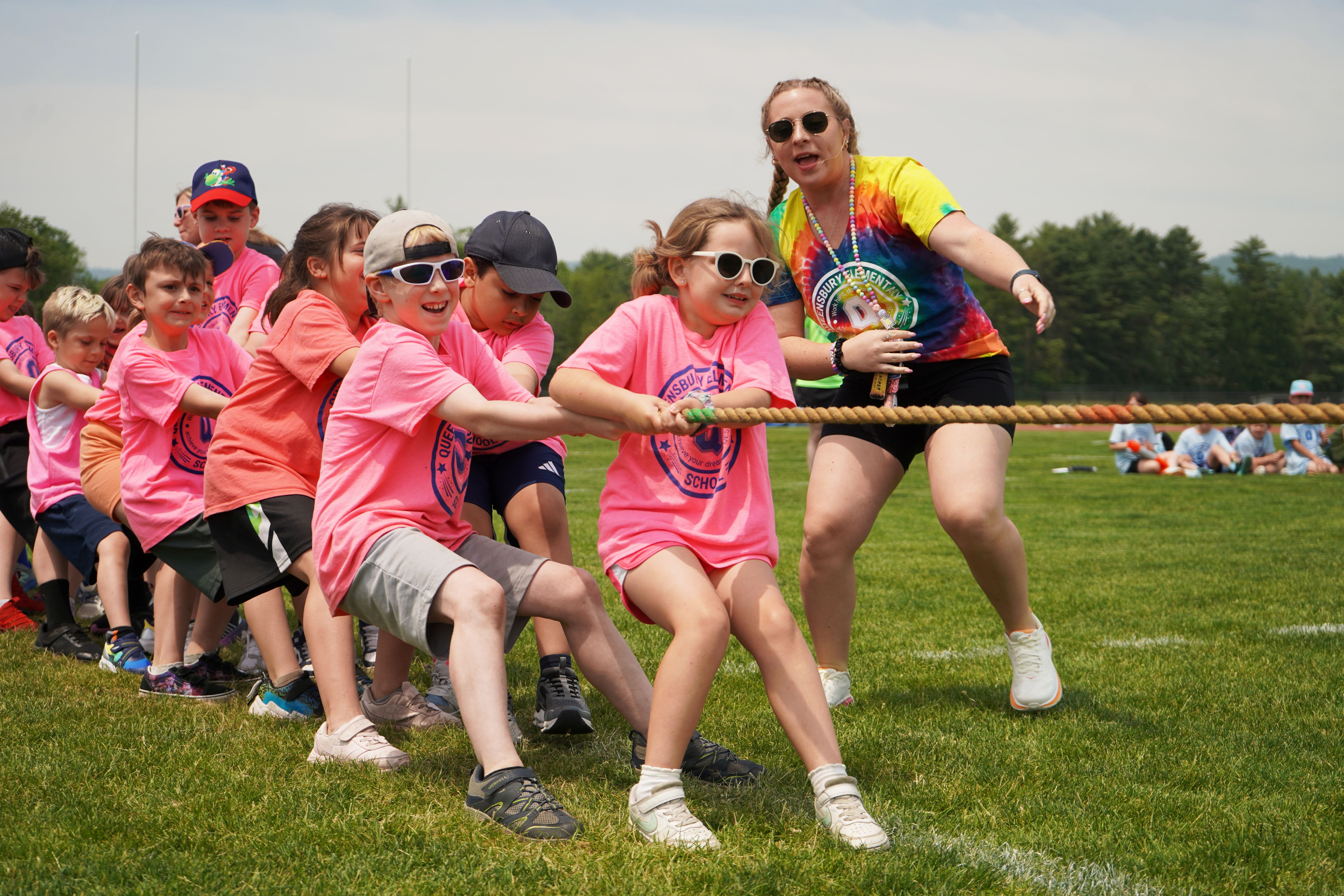 Second grade students compete in the tug-of-war during Field Day.