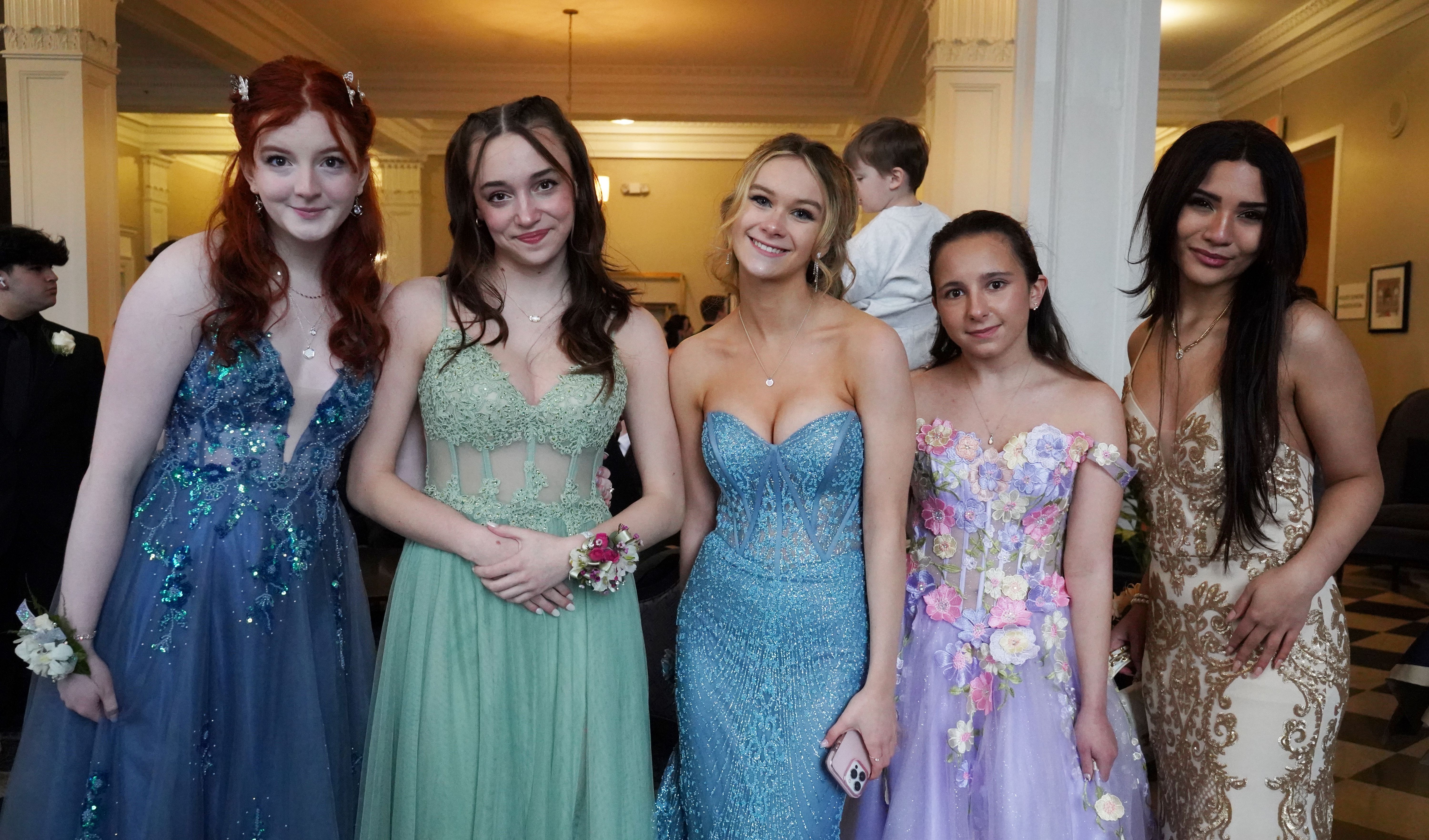 High school students dressed up for prom.
