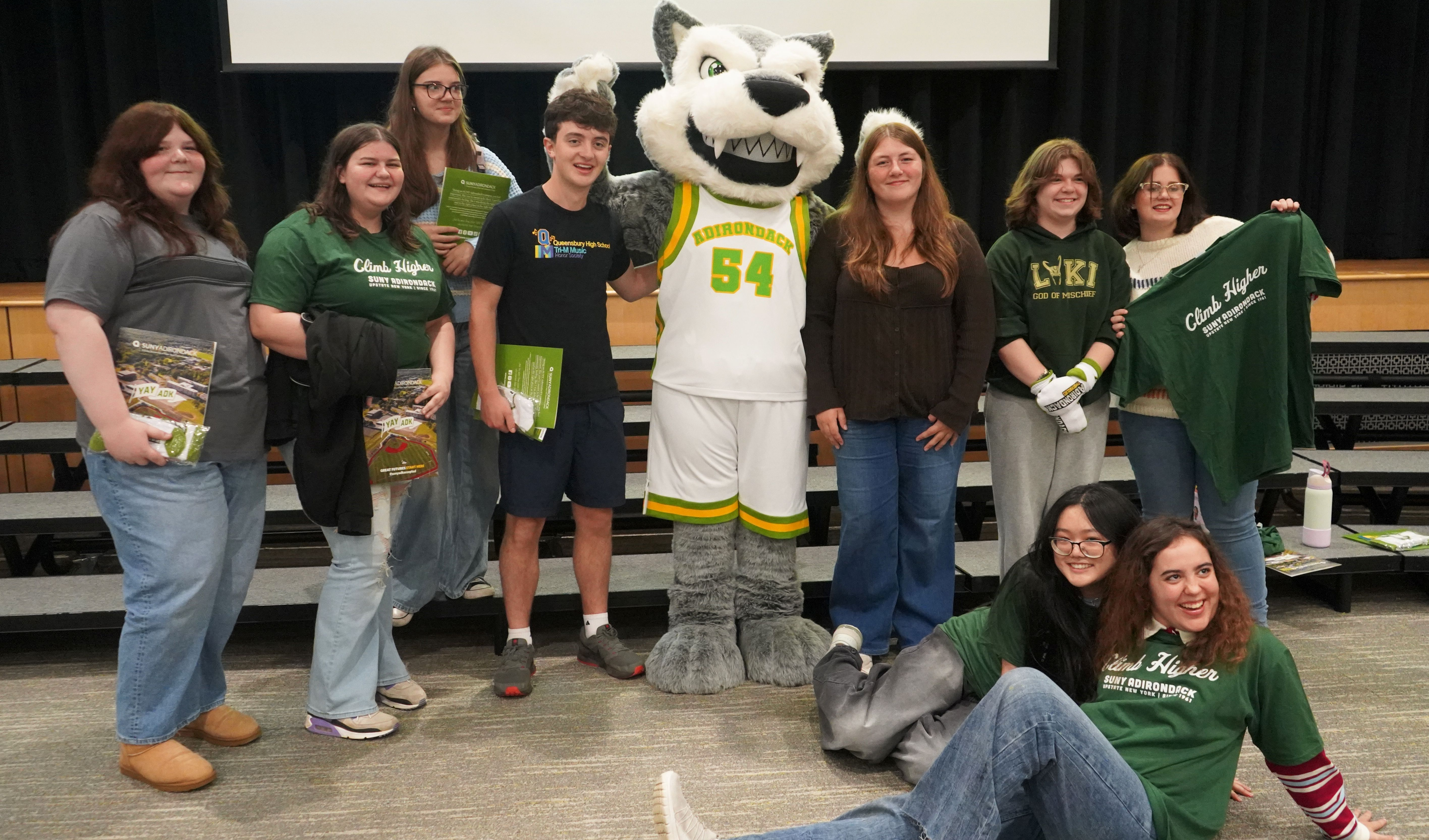 Seniors pose with SUNY Adirondack mascot during direct admit day.