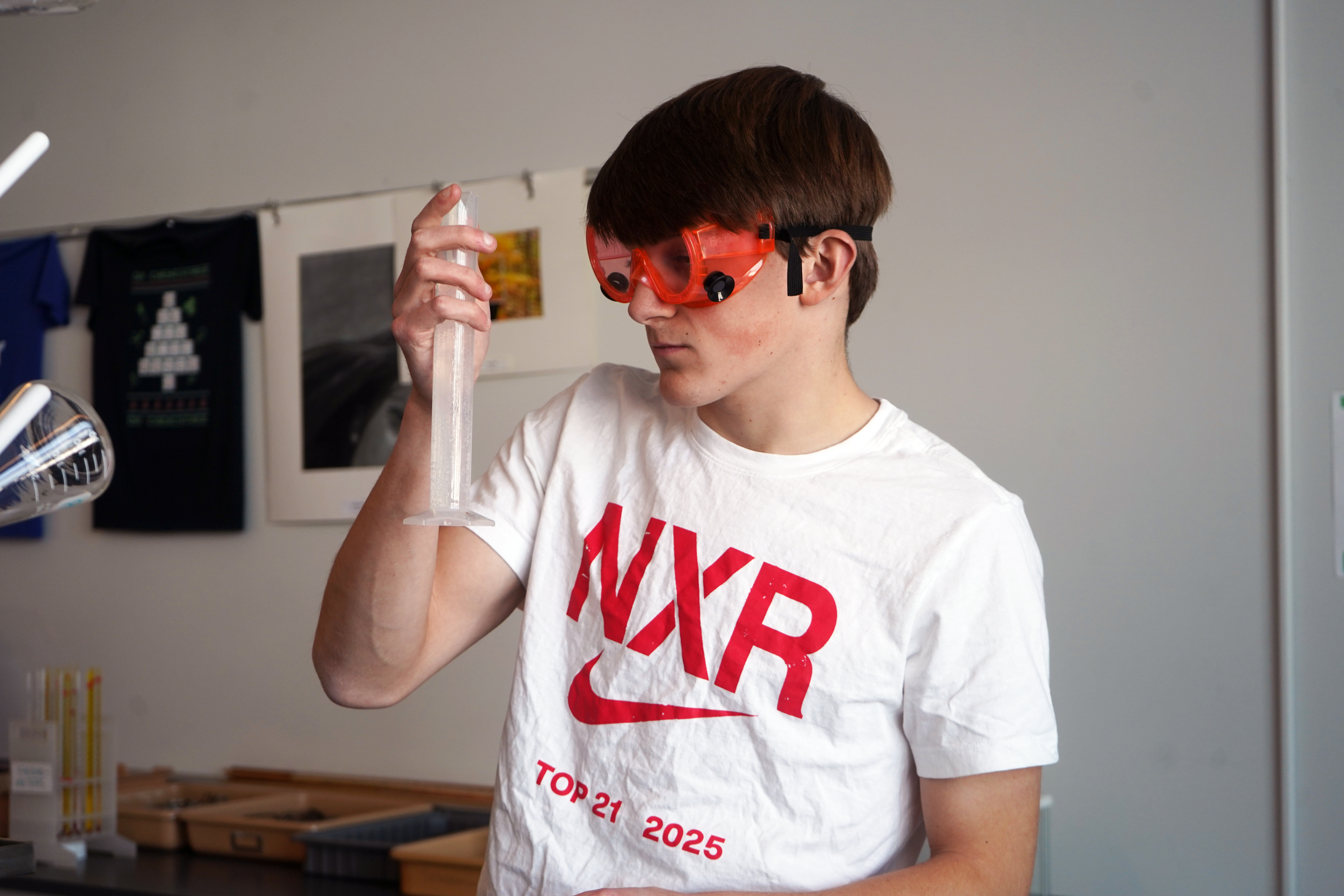 Student conducts science experiment.