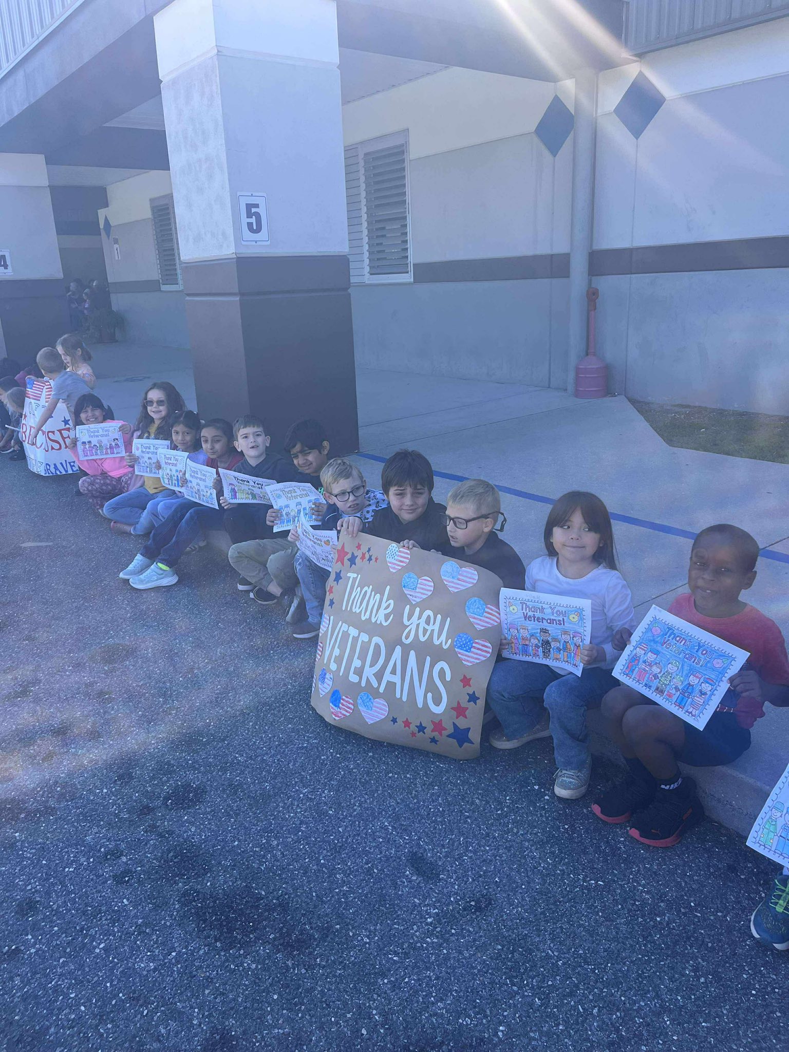 Students holding signs 