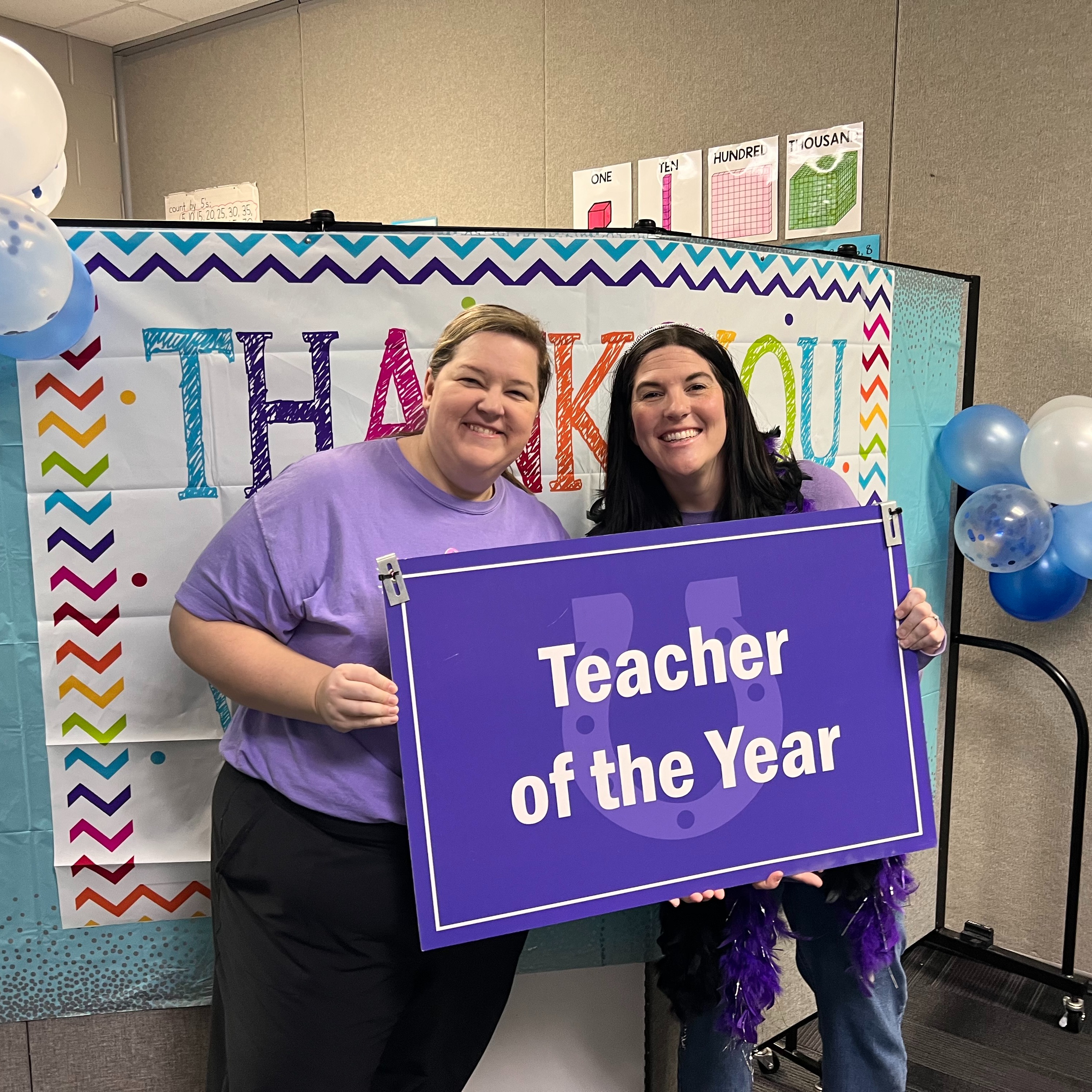 2 female teachers celebrating