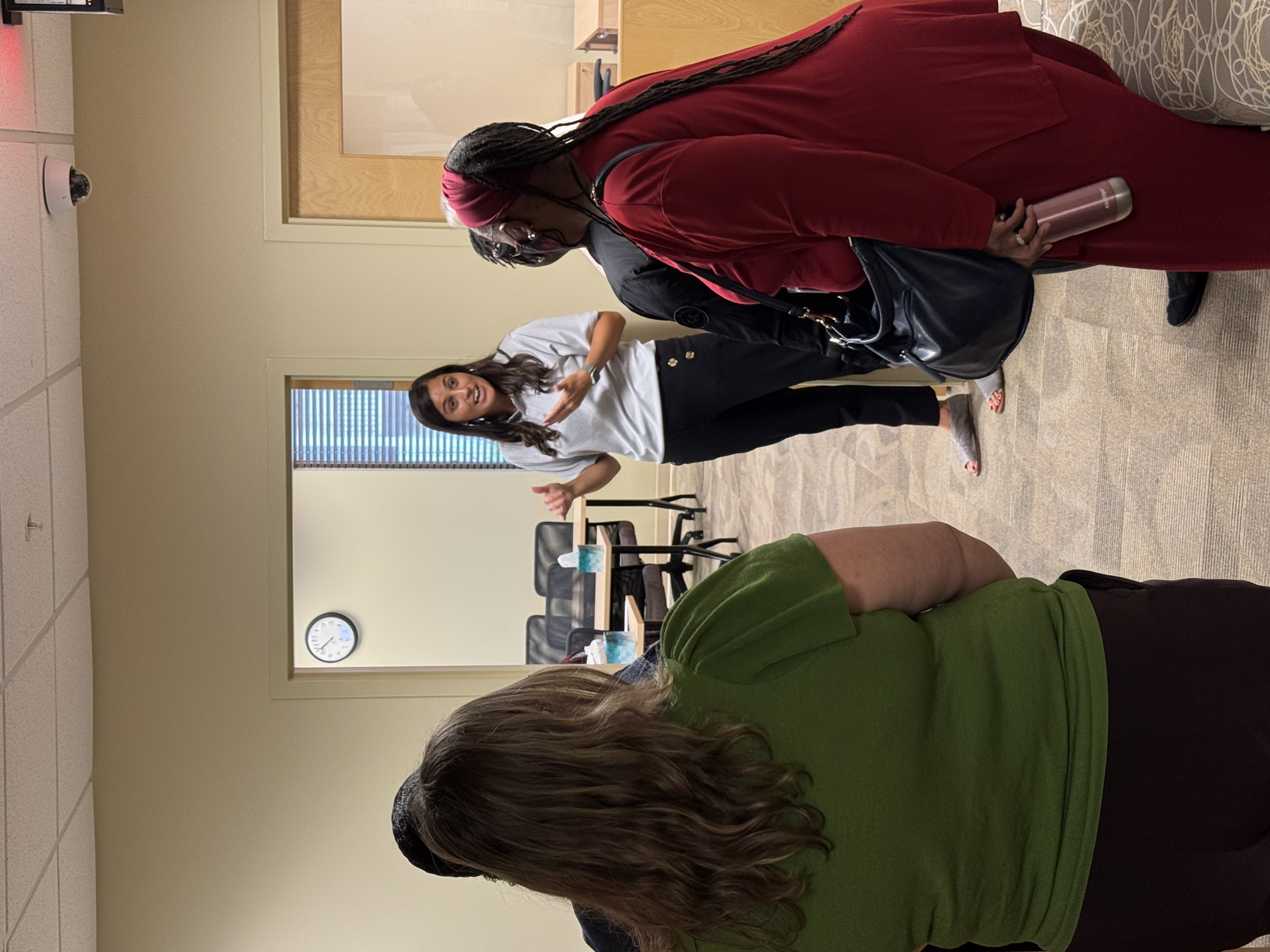 image of cathy stickel giving tour of new adult learning center